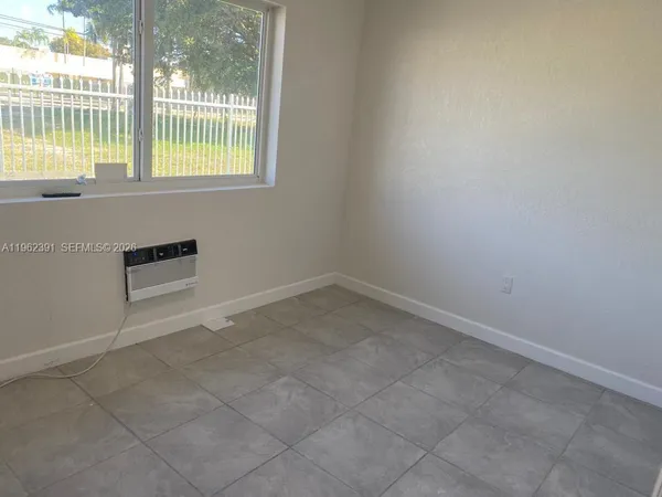 an empty room with a window