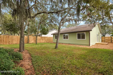 a house with trees in front of it