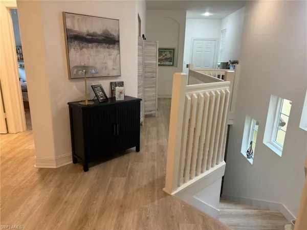 a bathroom with a double vanity sink mirror and shower