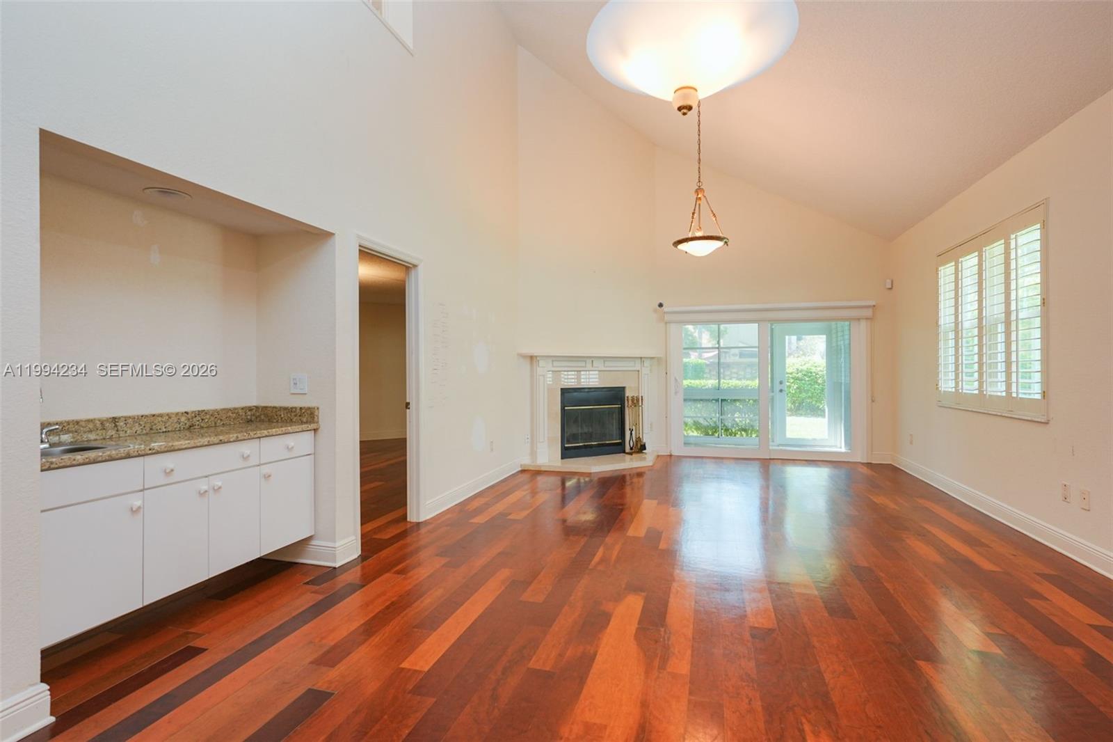 113 Durham Place Longwood, FL 32779 - Photo 24 of 56 a view of a kitchen with wooden floor and a sink