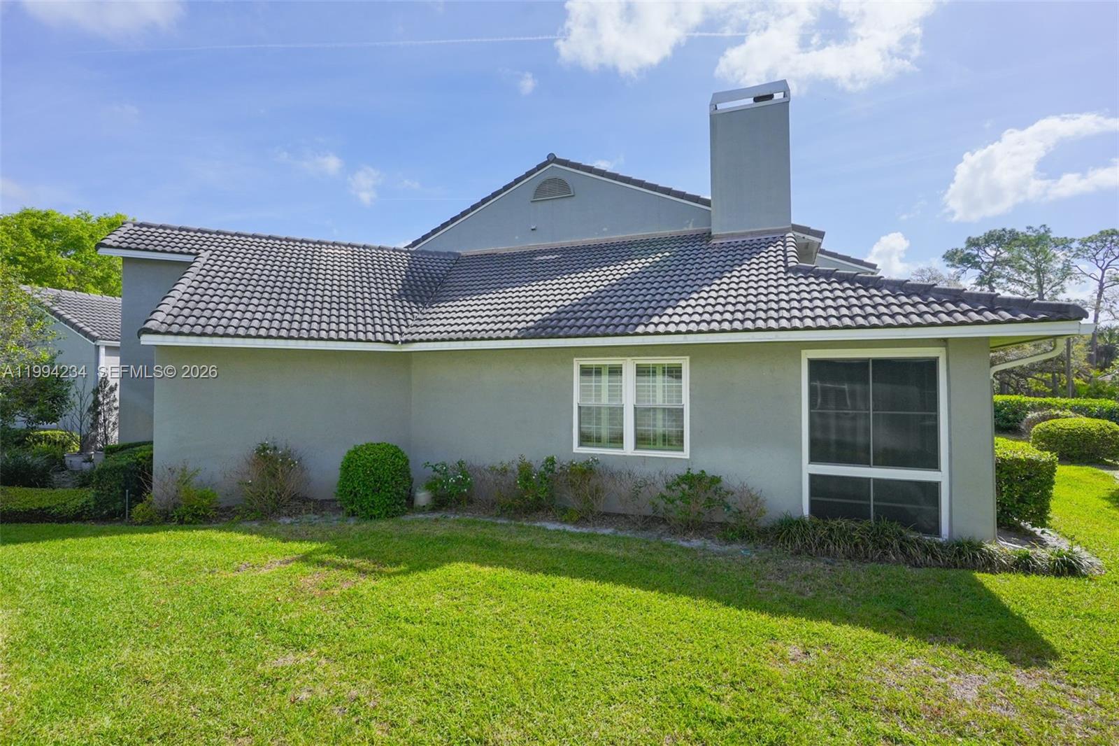 113 Durham Place Longwood, FL 32779 - Photo 39 of 56 a front view of a house with garden