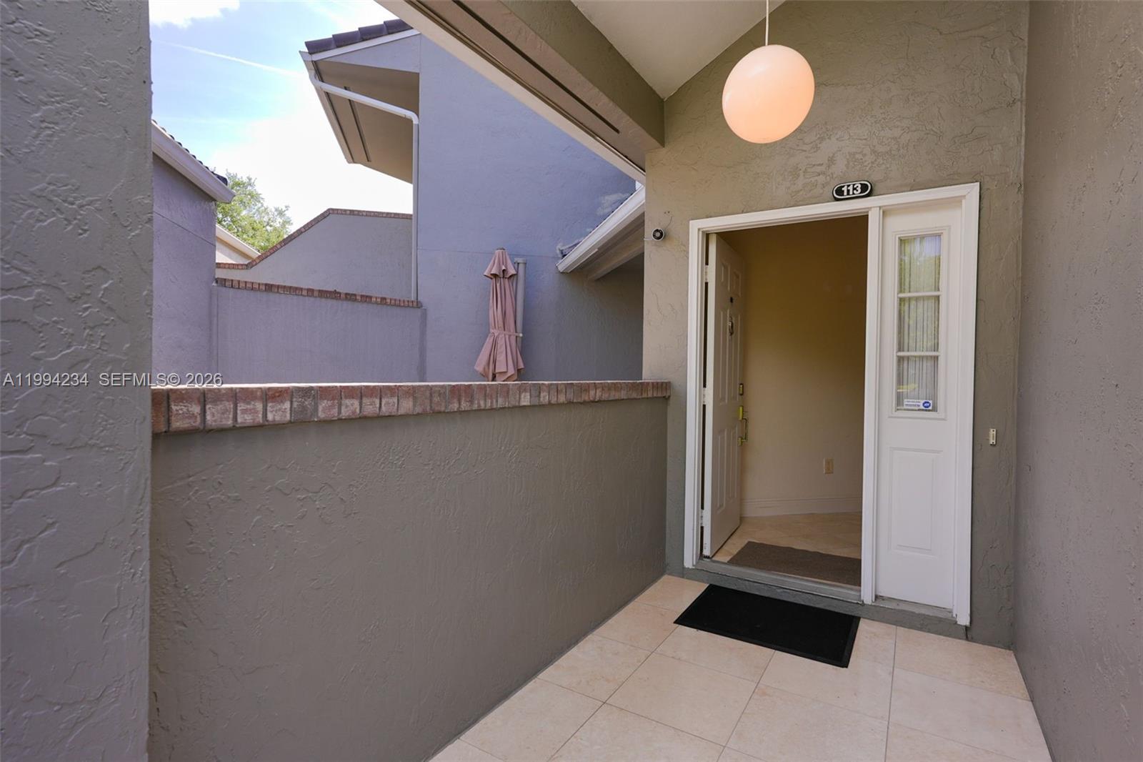 113 Durham Place Longwood, FL 32779 - Photo 6 of 56 a view of a door and a window