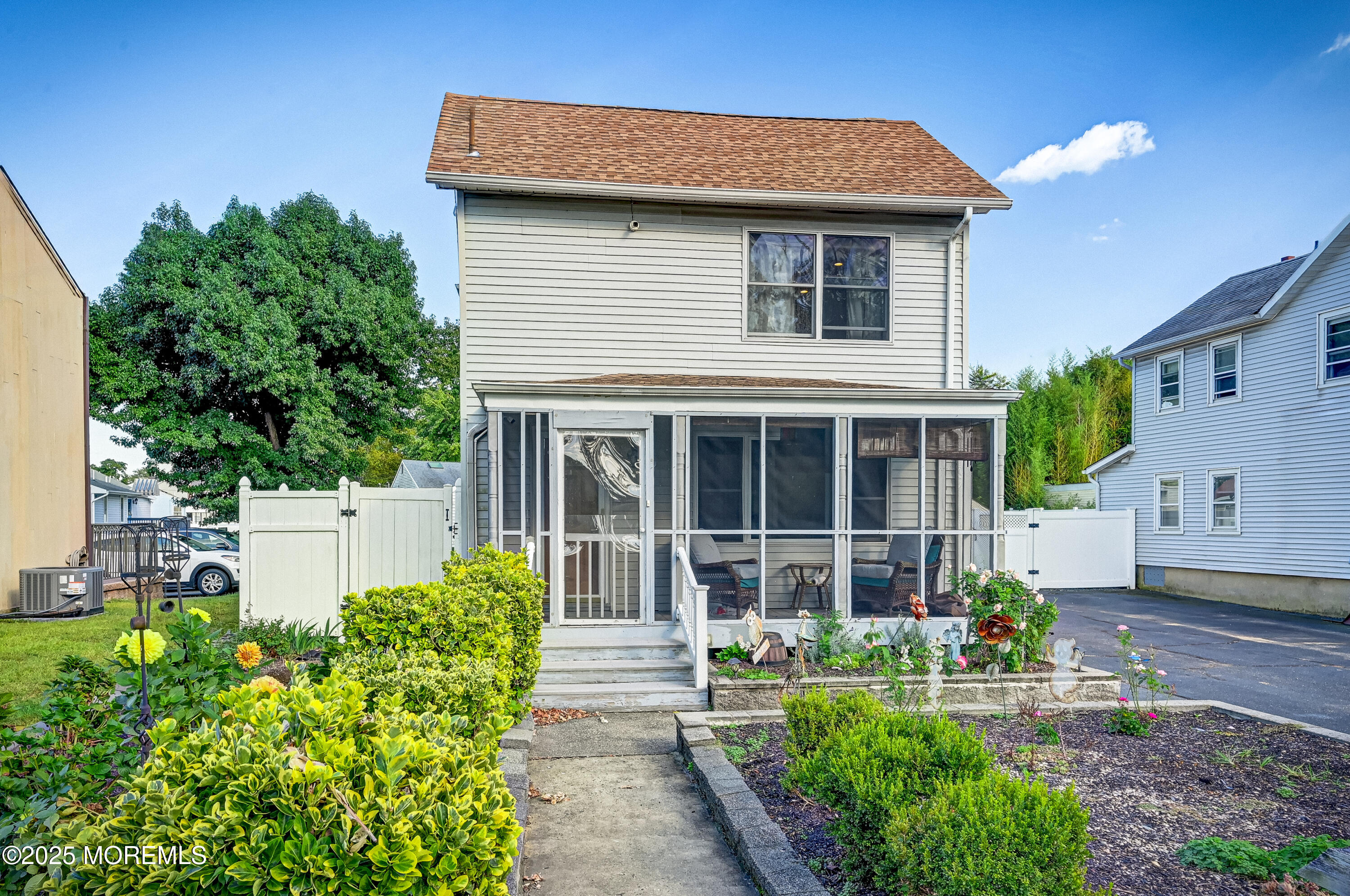 a house view with a garden space
