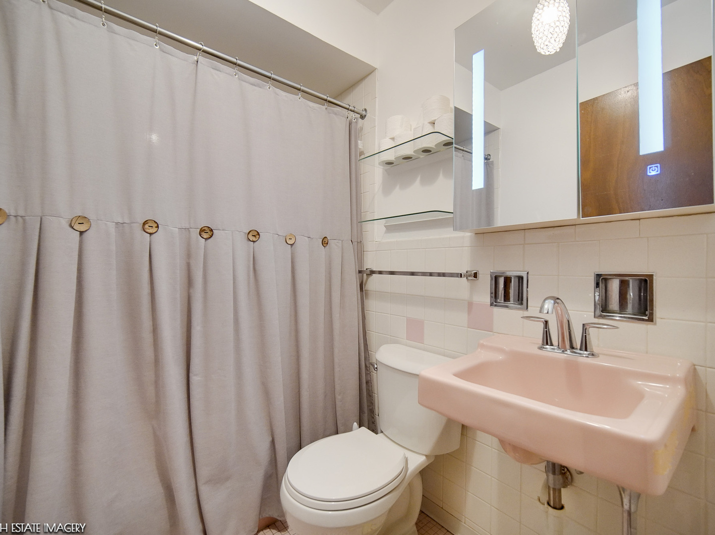 424 Elgin Avenue, Unit 7 Forest Park, IL 60130 - Photo 8 of 10 a bathroom with a sink a toilet and a mirror