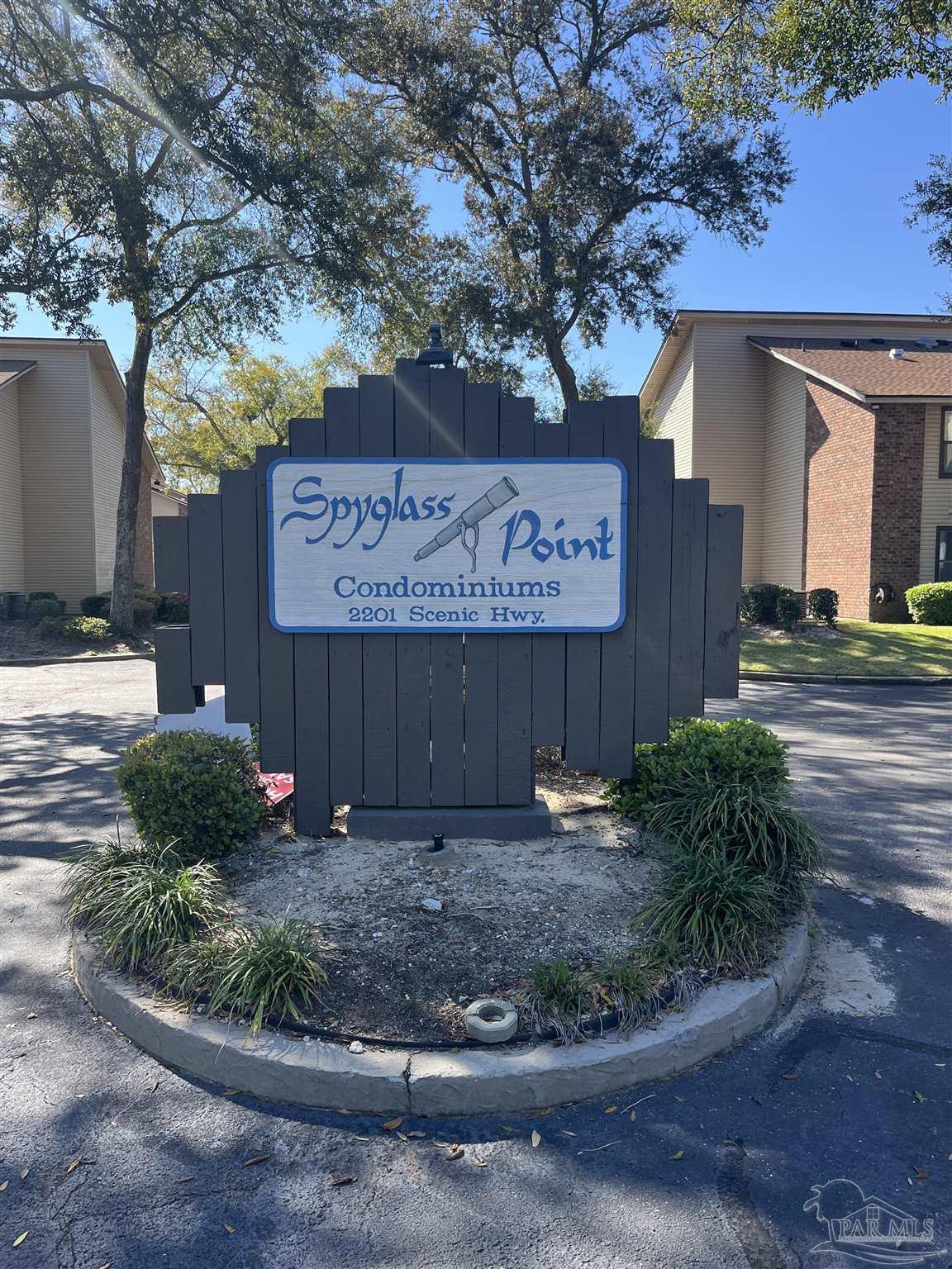 2201 Scenic Highway, Unit O3 Pensacola, FL 32503 - Photo 1 of 28 a sign that is in front of a building