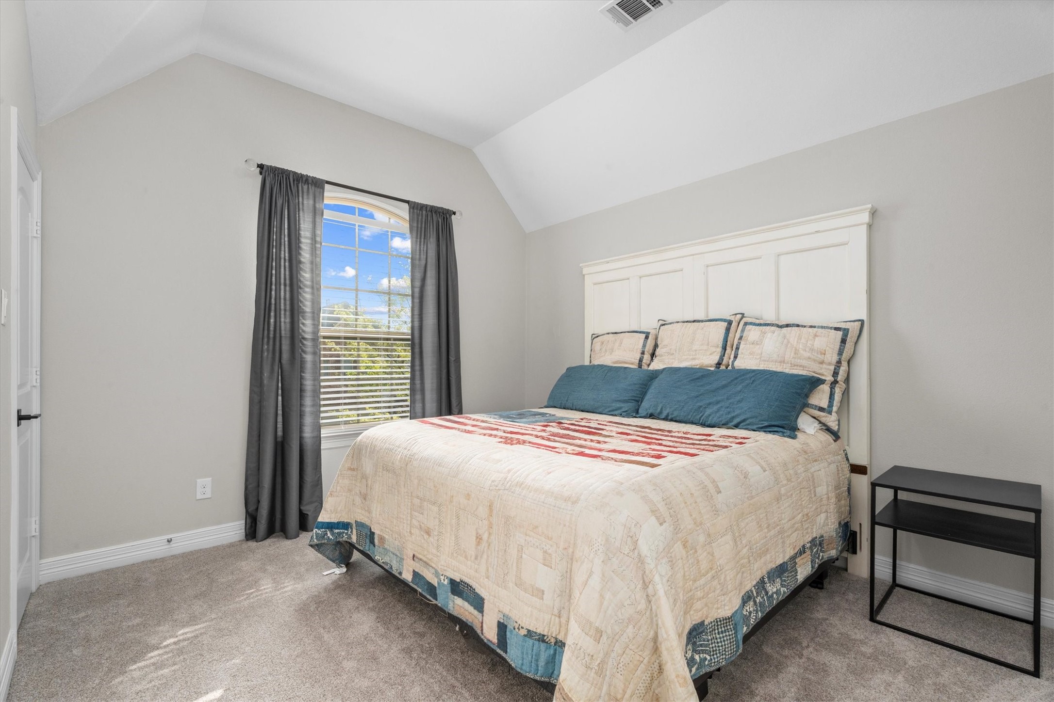 27121 Holtwood Grove Road Magnolia, TX 77354 - Photo 33 of 50 Upstairs, one of the secondary bedrooms offers a comfortable and private retreat, complete with its own full bathroom. Ideal for guests or family members seeking a bit of privacy, this well-appointed space ensures convenience and comfort.