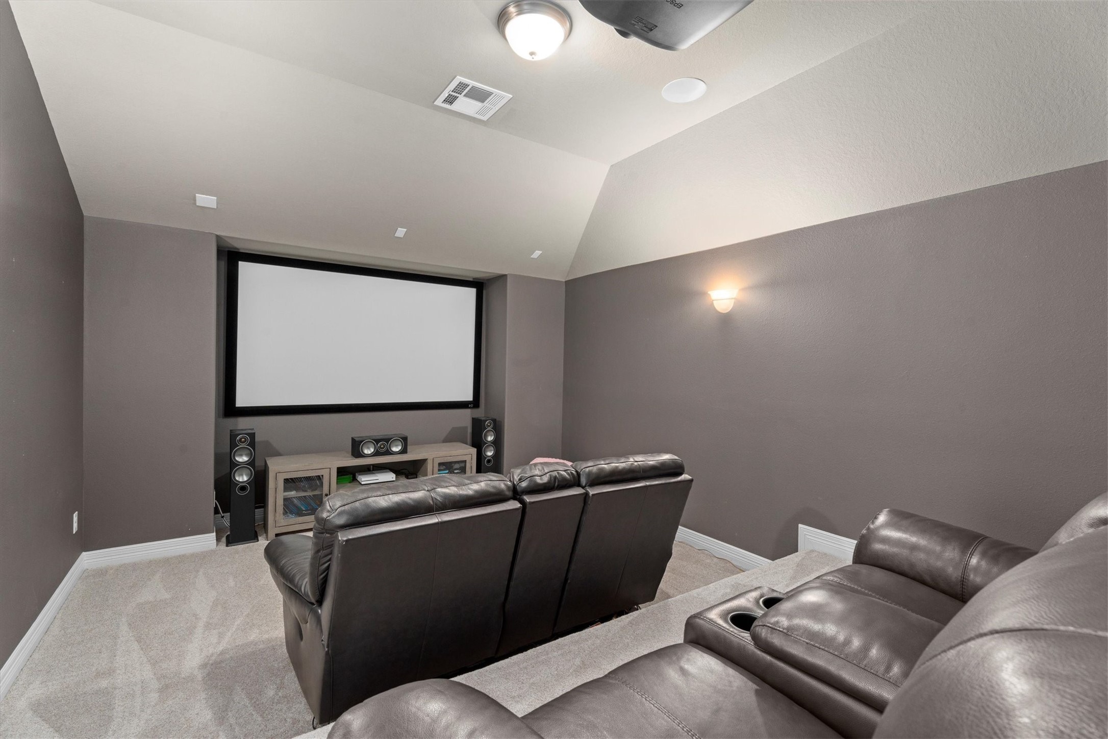 27121 Holtwood Grove Road Magnolia, TX 77354 - Photo 43 of 50 The media room is thoughtfully designed for the ultimate entertainment experience. With its ideal setup, this dedicated space is perfect for movie nights, gaming, or watching the big game in comfort and style.