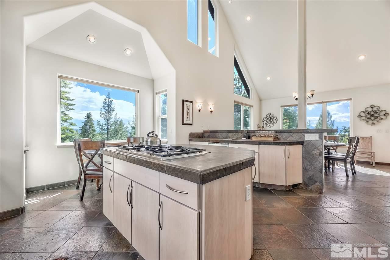 230 Chimney Rock Road Stateline, NV 89449 - Photo 9 of 25 a kitchen with a sink and stove