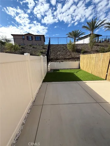 a view of a back yard of the house