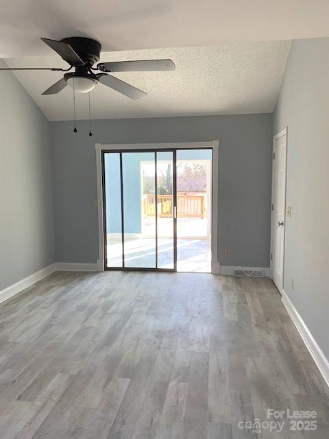 11112 5 Cedars Road Charlotte, NC 28226 - Photo 14 of 25 a view of an empty room with a window
