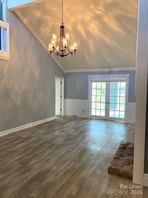 11112 5 Cedars Road Charlotte, NC 28226 - Photo 6 of 25 a view of a livingroom with a fireplace wooden floor and chandelier