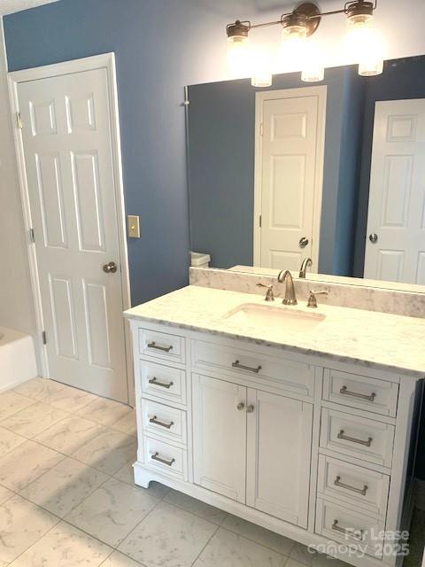 11112 5 Cedars Road Charlotte, NC 28226 - Photo 10 of 25 a bathroom with a sink vanity and a mirror