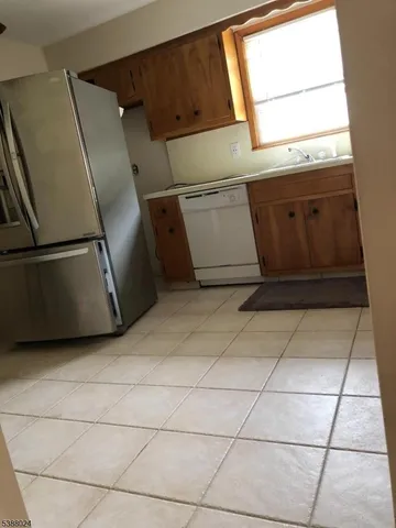 a utility room with washer and dryer