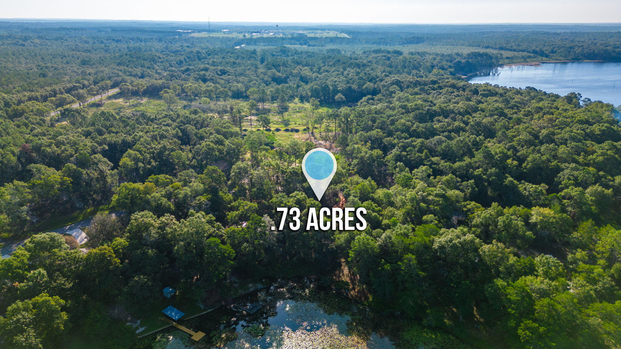 615 Squirrel Road DeFuniak Springs, FL 32433 - Photo 5 of 9 a view of a house with a yard