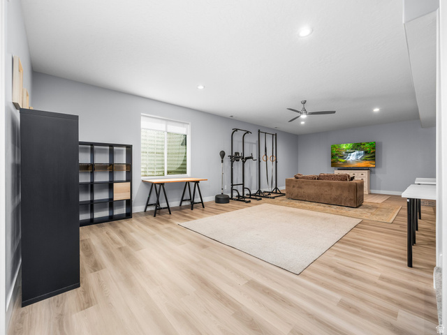 877 South Yarrow Drive Mapleton, UT 84664 - Photo 19 of 46 Spacious multi-purpose room featuring light wood-finish flooring, recessed lighting, and a ceiling fan