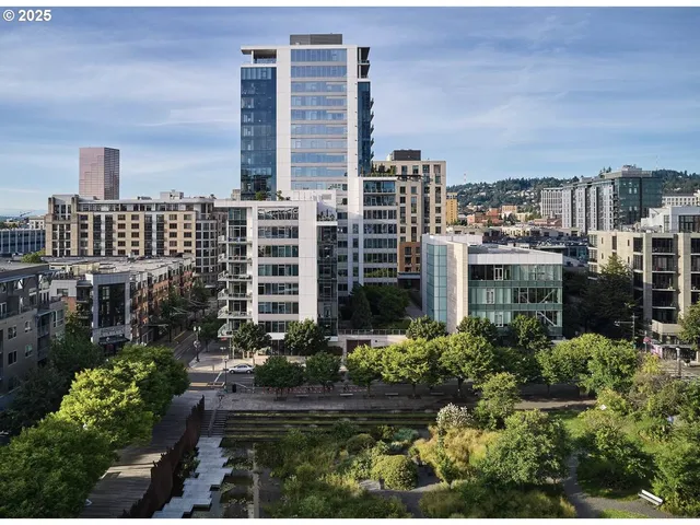 a view of a city with tall buildings