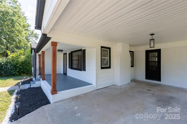 view of living room with furniture and cabinets