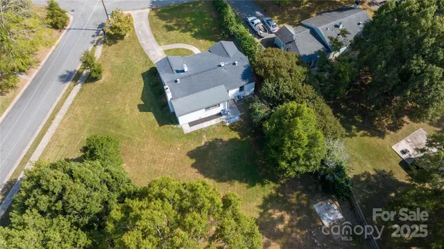 an aerial view of a house with a garden