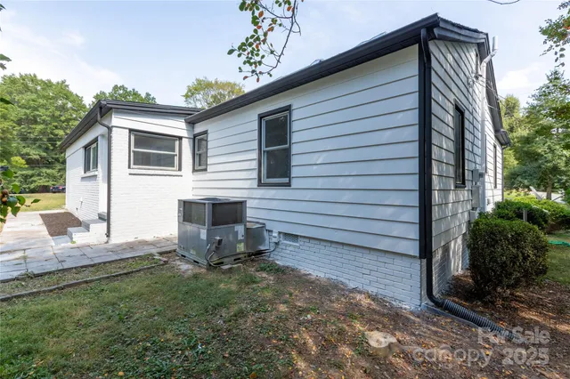 a front view of a house with yard