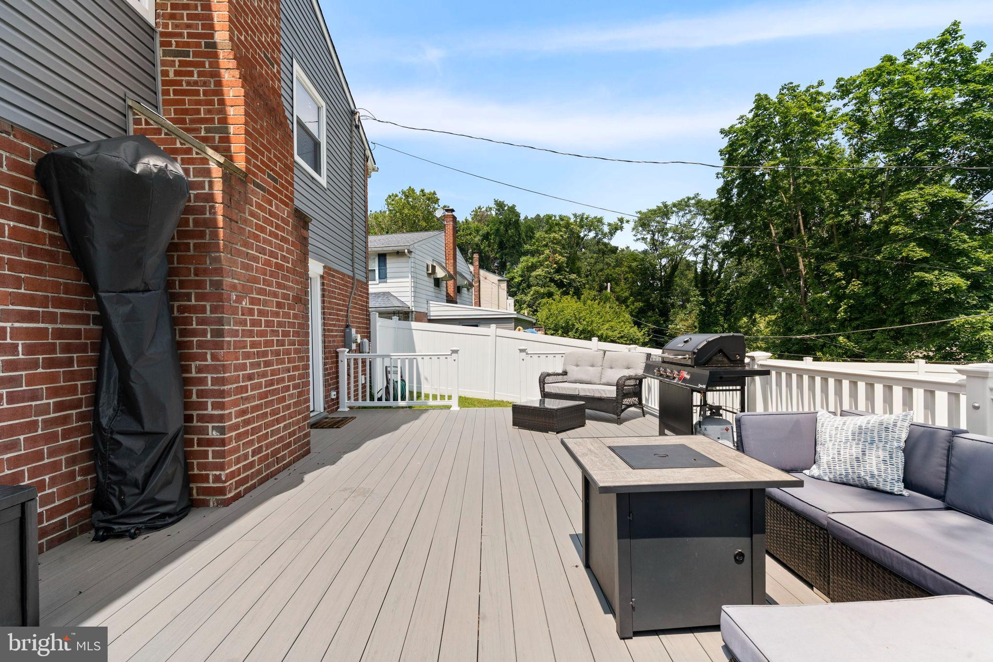 431 Penn Lane Springfield, PA 19064 - Photo 33 of 37 Spacious deck with serene green views.