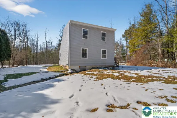 a view of backyard of house