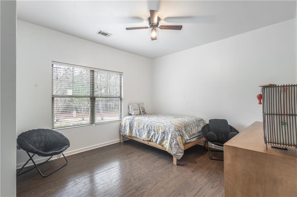 21 Sunny Point Newnan, GA 30263 - Photo 12 of 33 a bedroom with a bed and a window