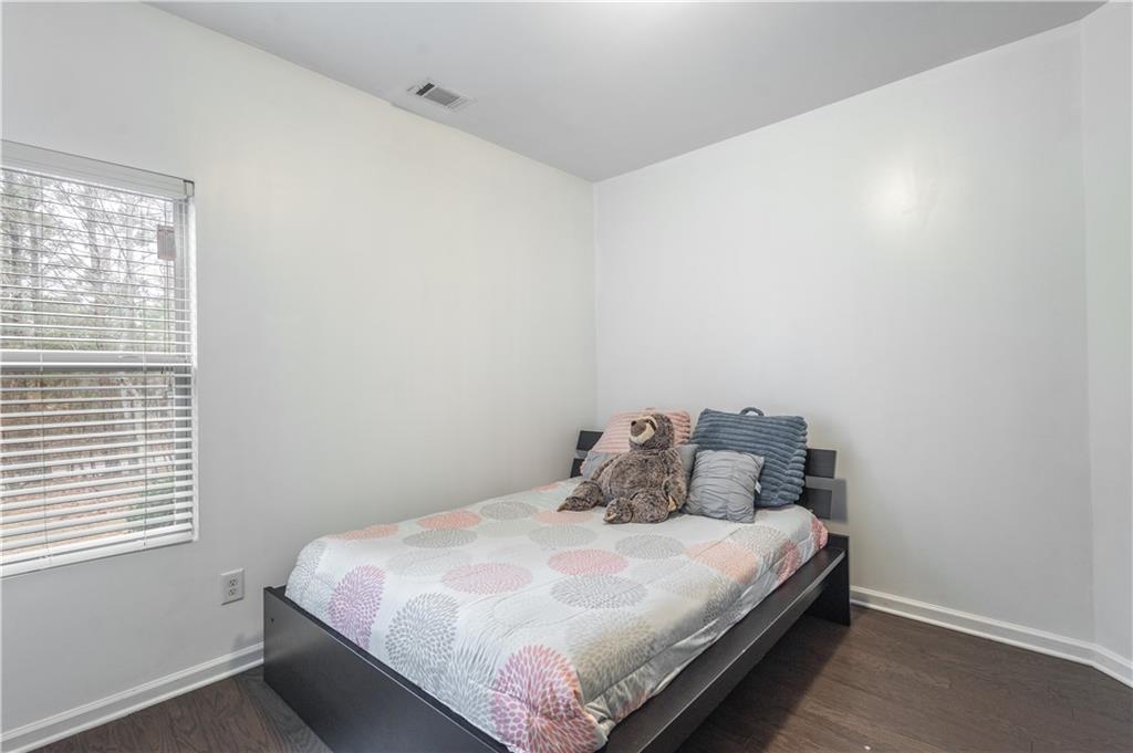 21 Sunny Point Newnan, GA 30263 - Photo 15 of 33 a bedroom with a bed and window