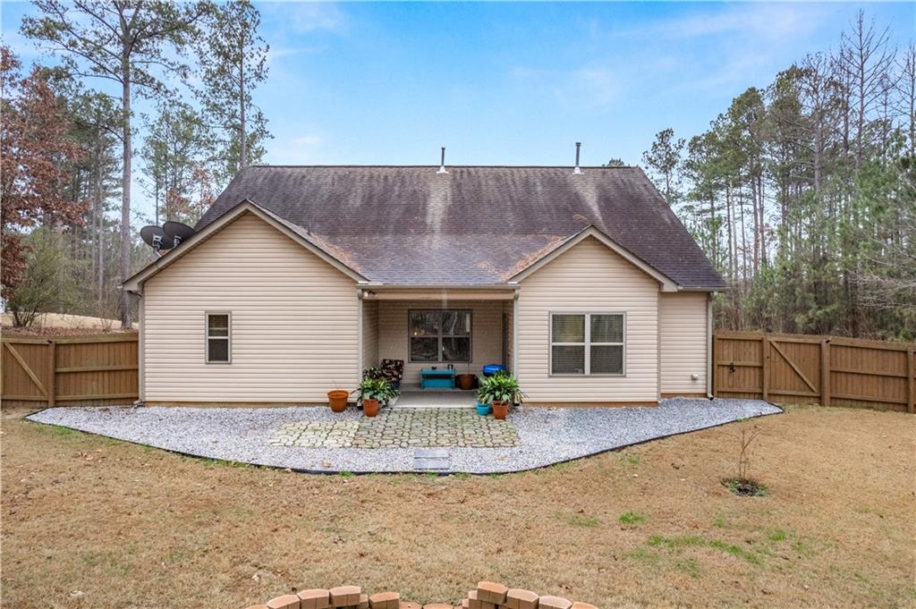 21 Sunny Point Newnan, GA 30263 - Photo 28 of 33 a view of a house with a yard and large tree