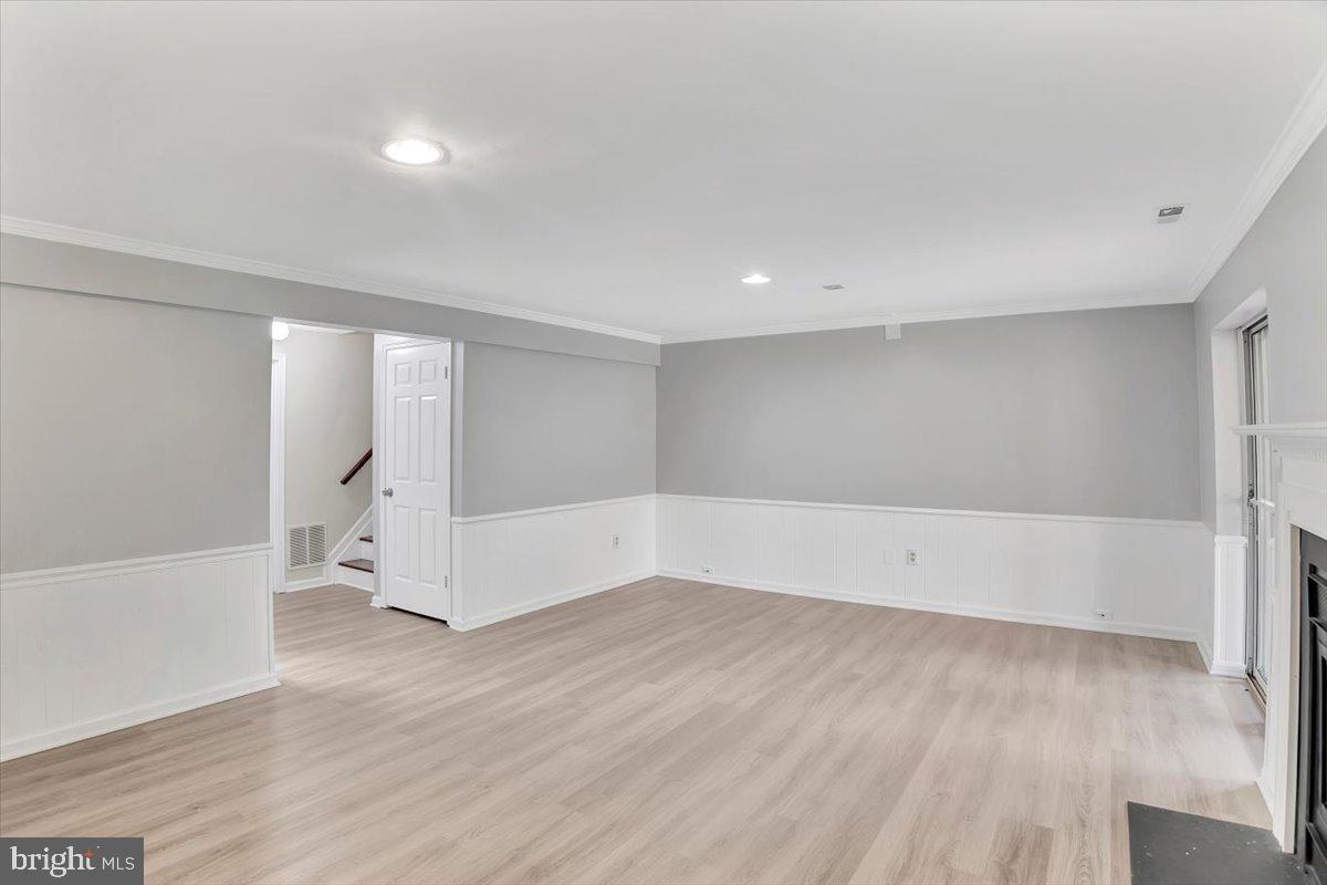 8530 London Bridge Way Lutherville-Timonium, MD 21093 - Photo 19 of 23 a view of an empty room with wooden floor and a window
