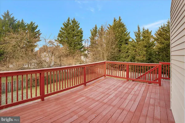 a view of balcony with wooden floor