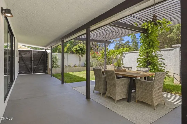 a view of swimming pool with a patio