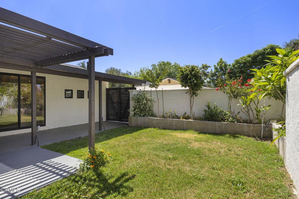 240 North Padre Juan Avenue Ojai, CA 93023 - Photo 26 of 50 a view of a house with backyard and garden
