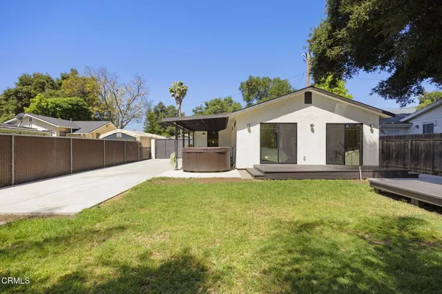 a view of a backyard with a deck