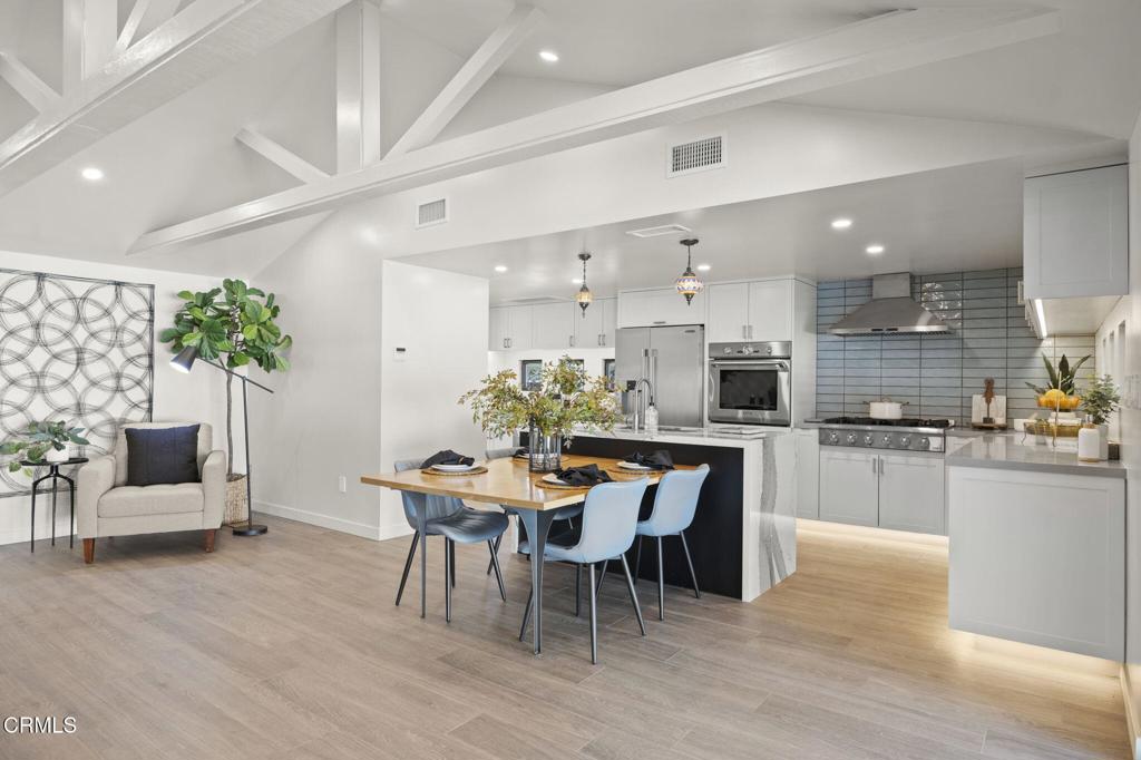 240 North Padre Juan Avenue Ojai, CA 93023 - Photo 3 of 50 a dining room with furniture and kitchen view