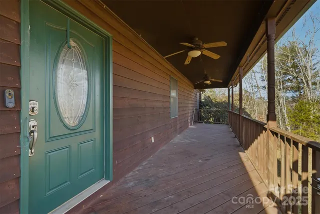 a view of a entryway door with wooden floor