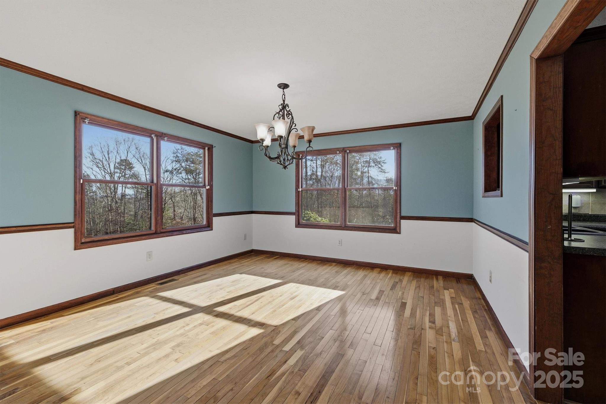 5341 Reese Store Avenue Morganton, NC 28655 - Photo 16 of 45 a view of livingroom with window and wooden floor
