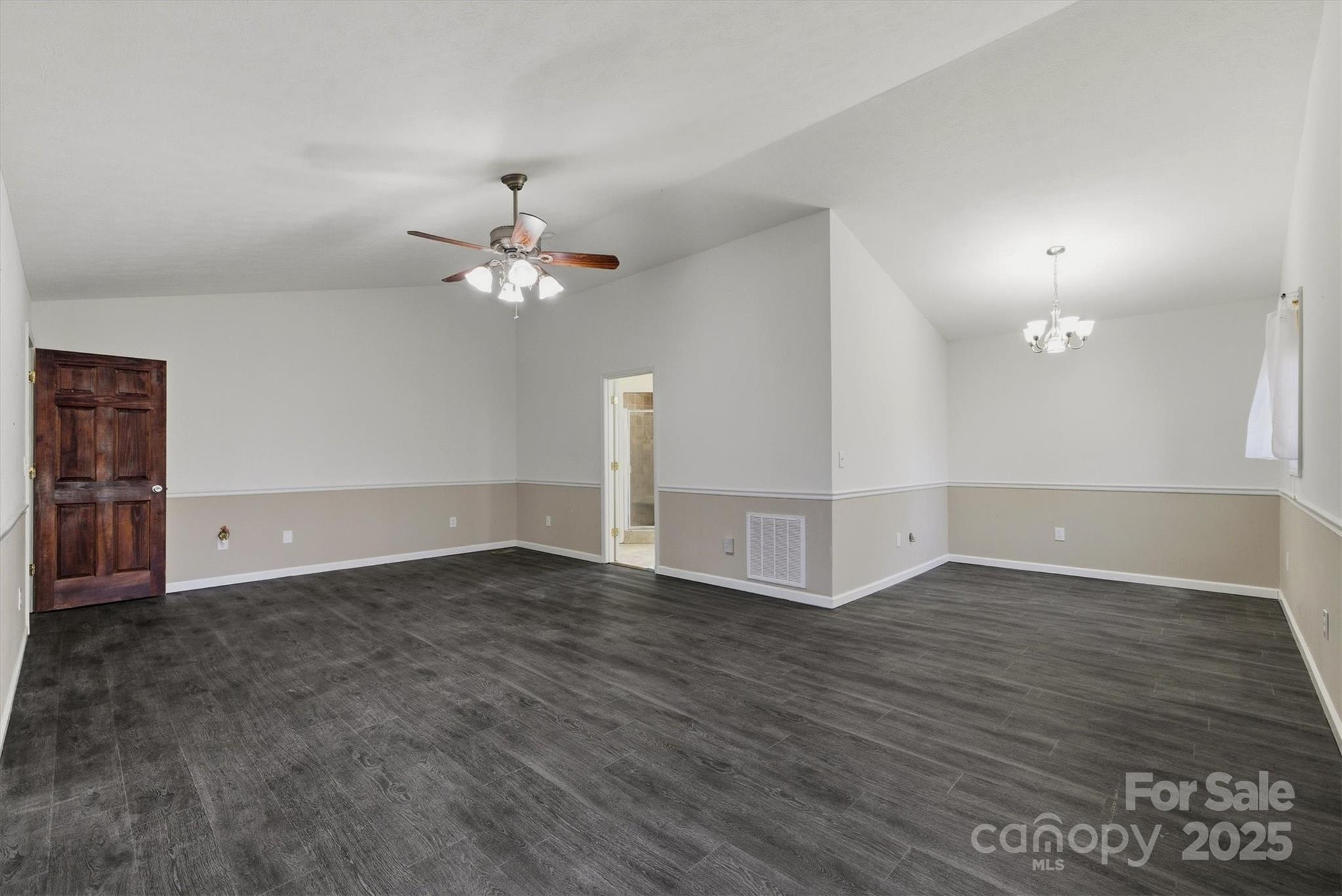 5341 Reese Store Avenue Morganton, NC 28655 - Photo 24 of 45 a view of an empty room with wooden floor and a ceiling fan