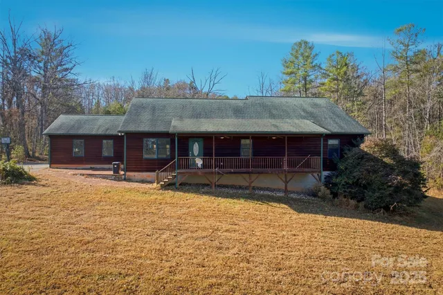 a front view of a house with yard and seating space
