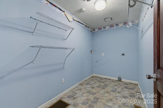 a view of a room with racks on the wall