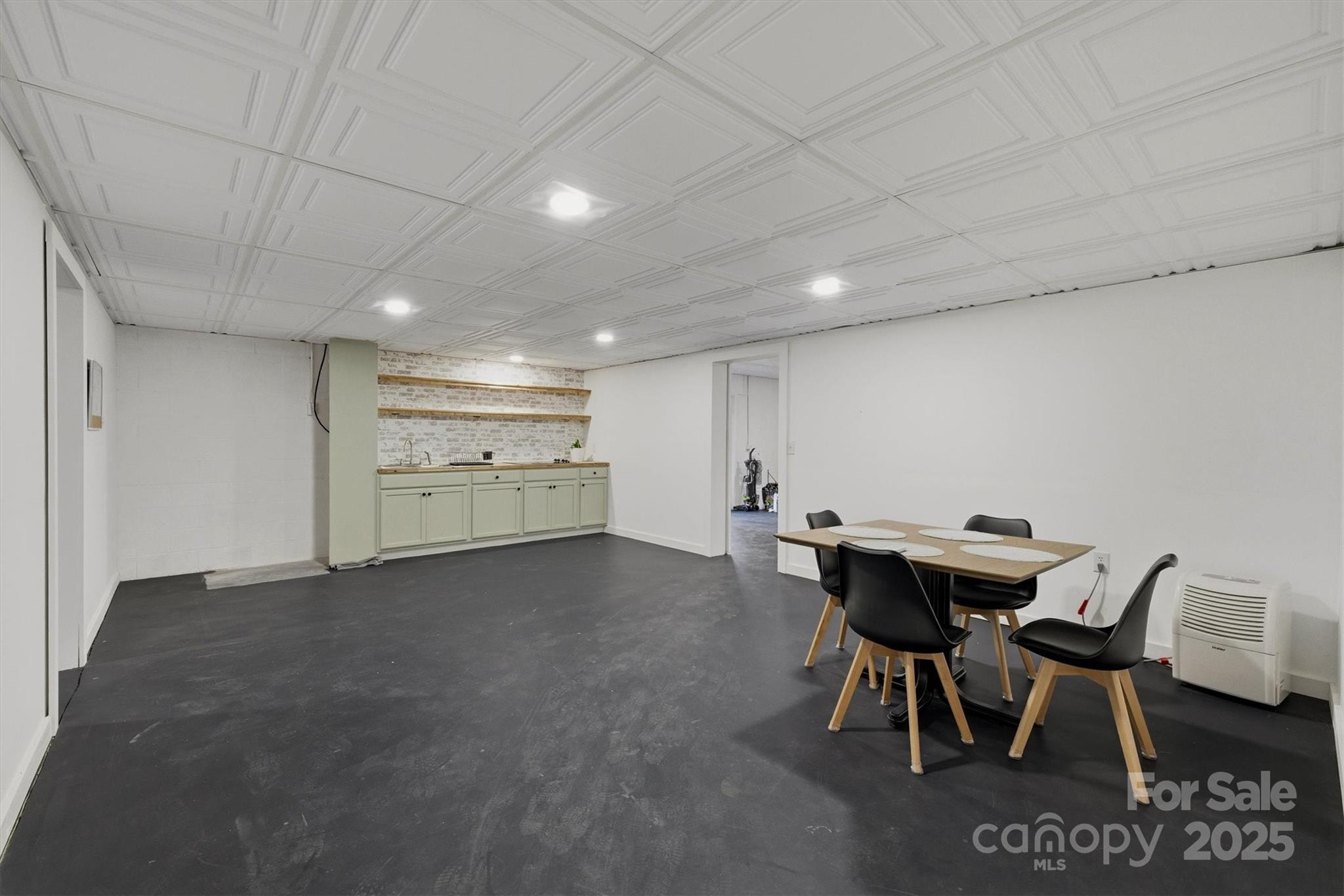 5341 Reese Store Avenue Morganton, NC 28655 - Photo 38 of 45 a view of a dining room with furniture and a kitchen