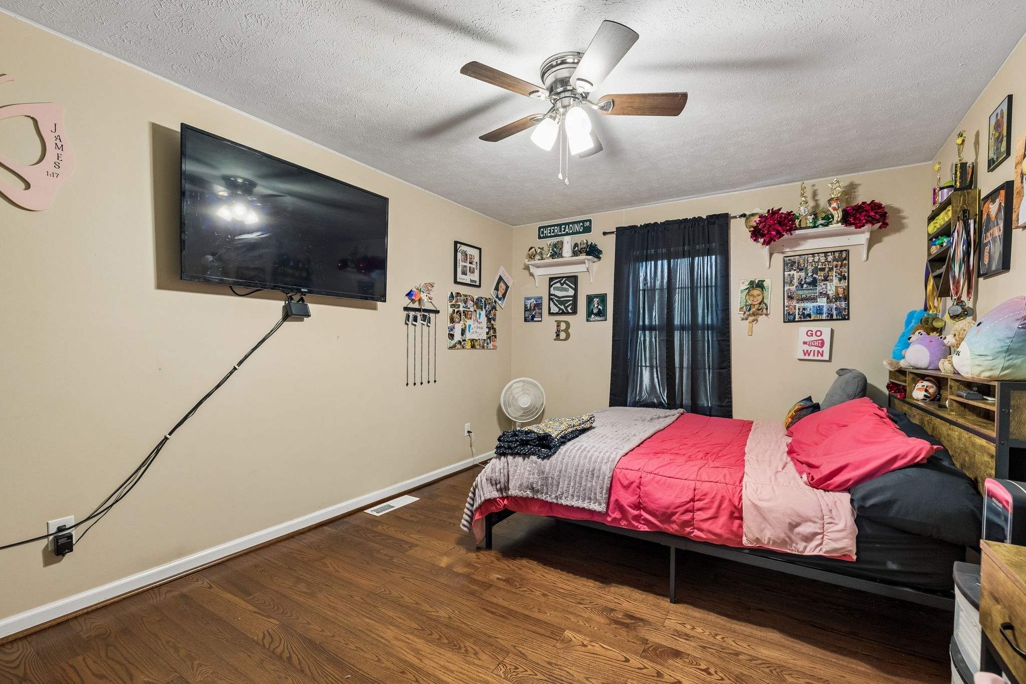 2075 Nikki Drive Springfield, TN 37172 - Photo 23 of 58 a bedroom with a bed and a flat screen tv