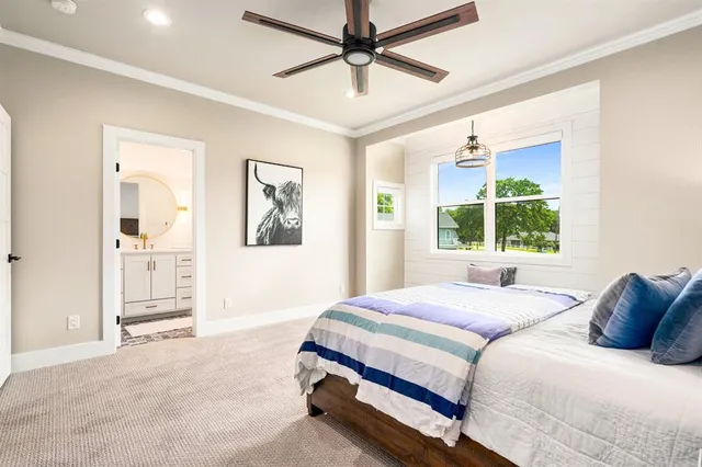 an aerial view of a house with swimming pool garden and lake view