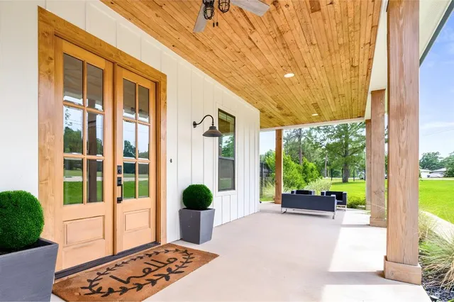a living room with furniture and window