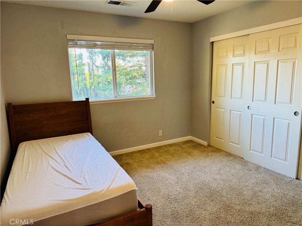 2673 Lakewest Drive Chico, CA 95928 - Photo 15 of 26 a room with a bed and a window