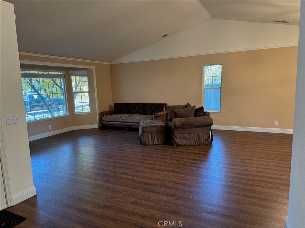 2673 Lakewest Drive Chico, CA 95928 - Photo 8 of 26 a living room with furniture window and wooden floor