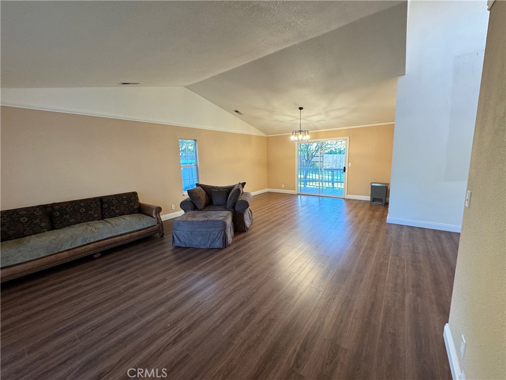 2673 Lakewest Drive Chico, CA 95928 - Photo 9 of 26 a living room with furniture and a wooden floor