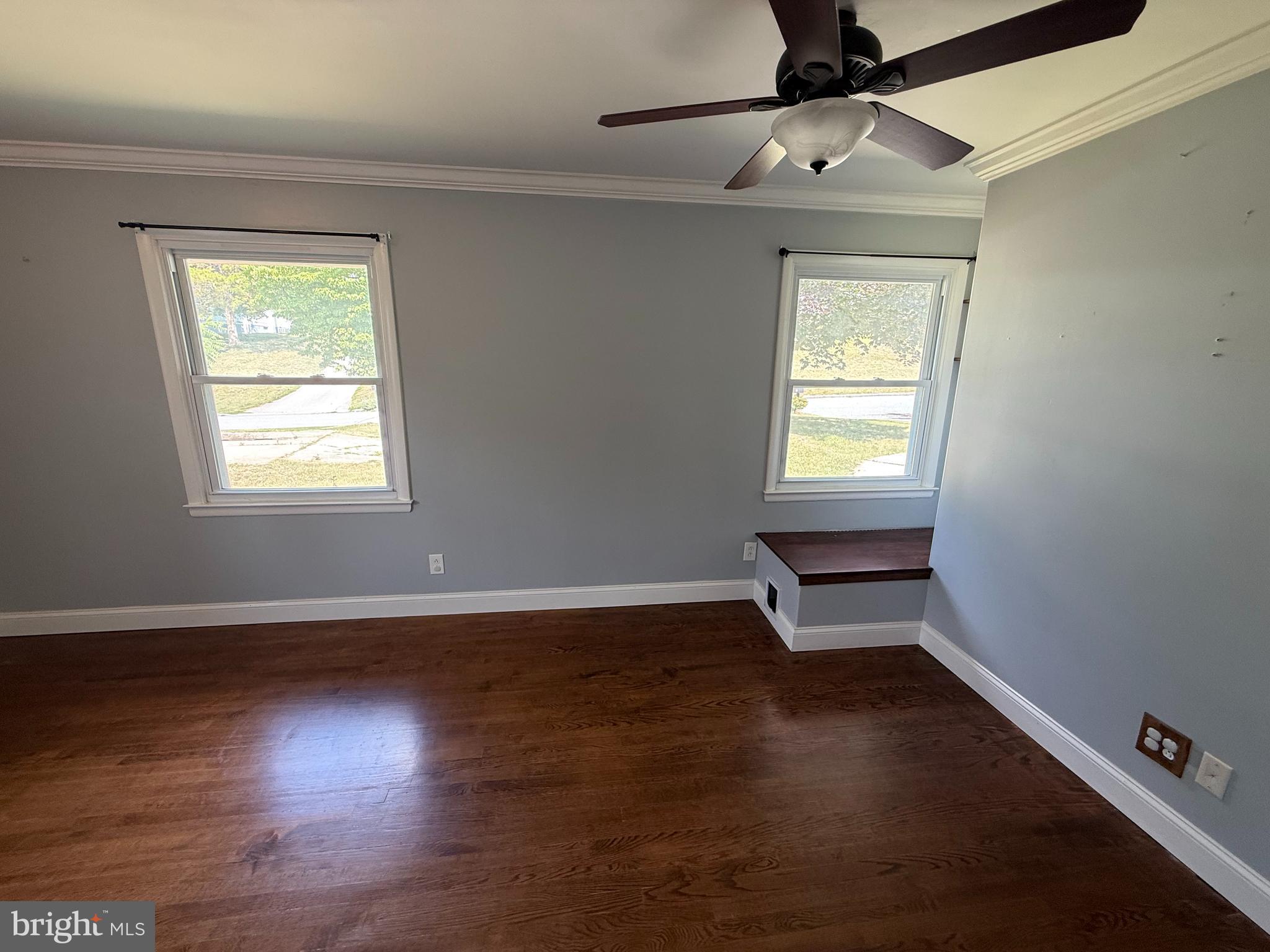 858 Star Court Union Bridge, MD 21791 - Photo 16 of 37 a view of an empty room with wooden floor and a window