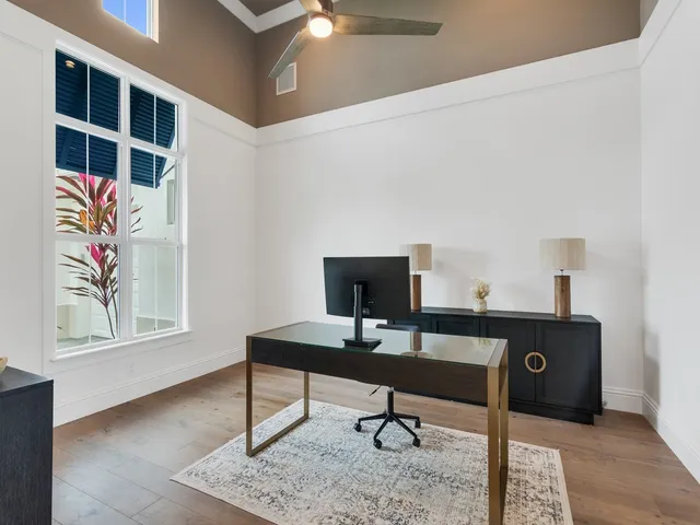 a view of a workspace with furniture