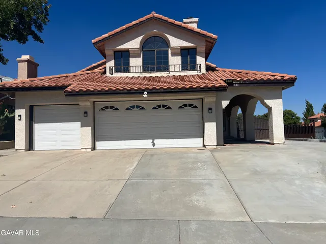 a view of a house with a garage