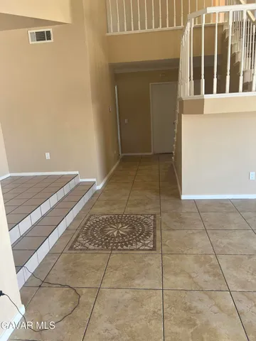 a view of a backyard of a house